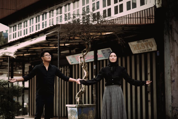 Couple Dancing On City Street