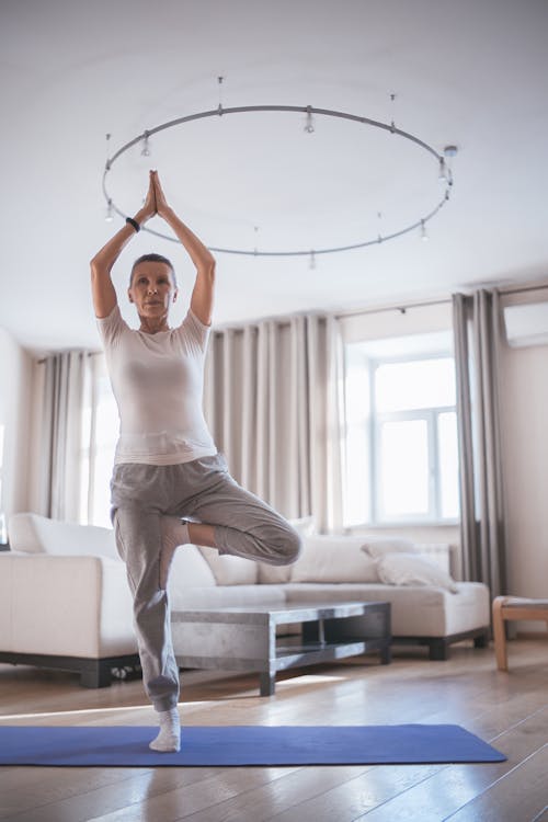 Senior Woman Doing Yoga Exercise