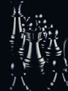 Grayscale Photo of a Chess Pieces
