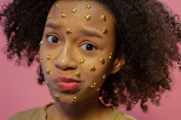 Black Girl With Rhinestone Stars On Face