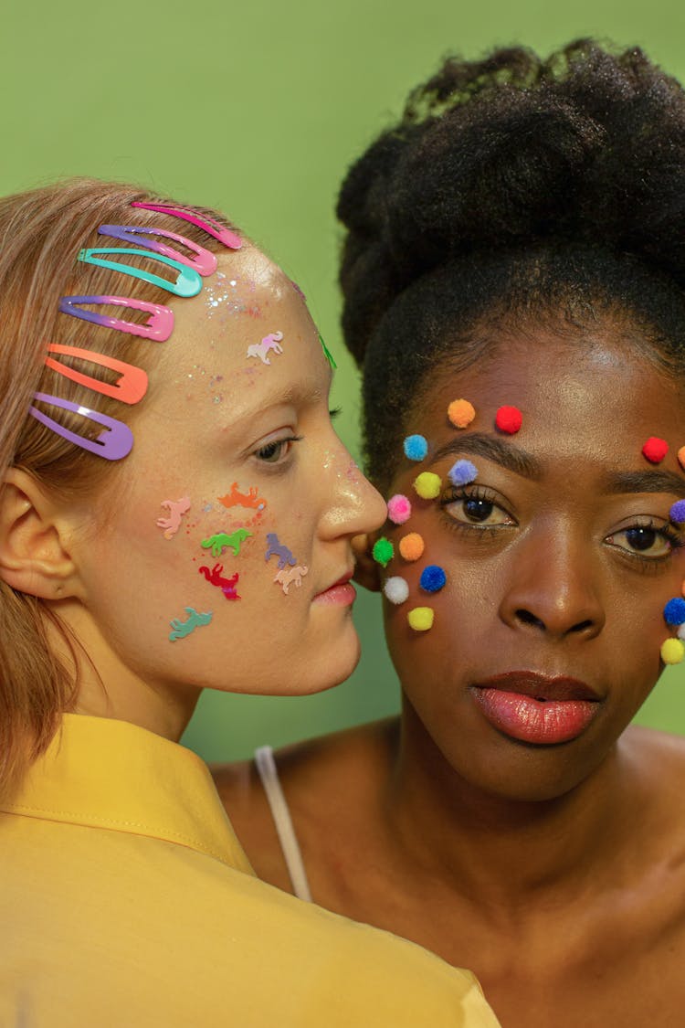 Diverse Women With Different Decorations On Face