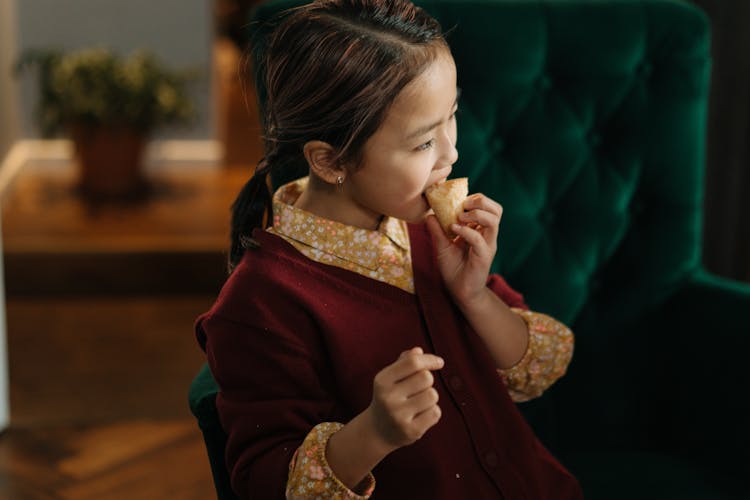 Girl Eating Bread