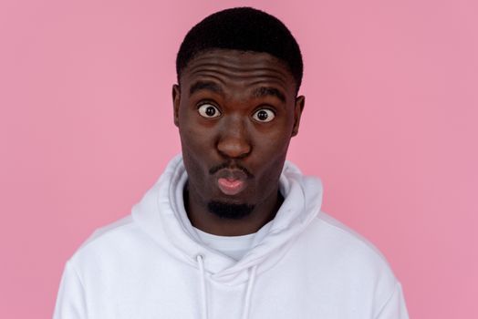 Funny black man making grimace and pouting lips