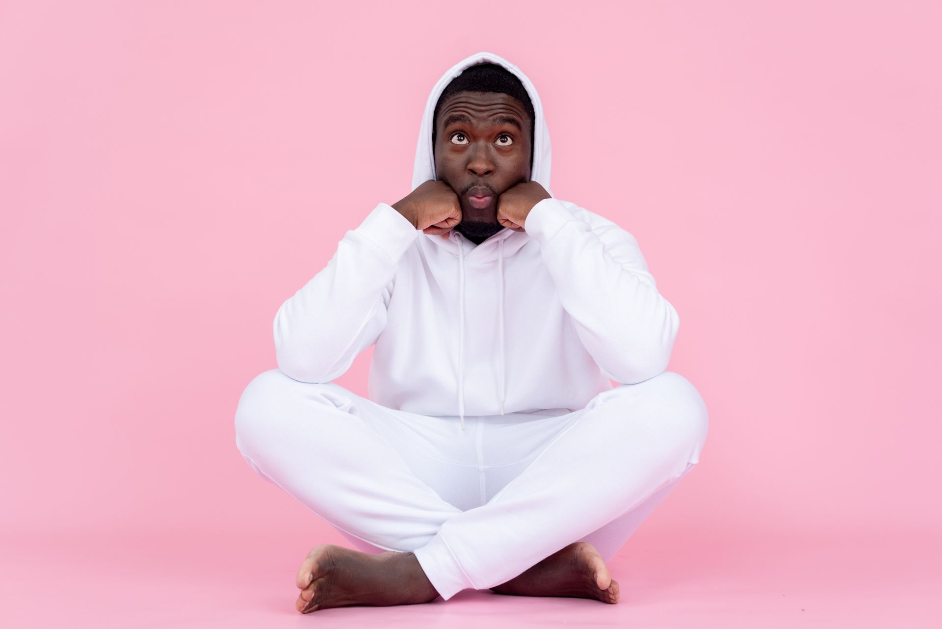 Black childish man making funny face