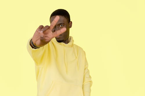 Man in Yellow Pullover Hoodie