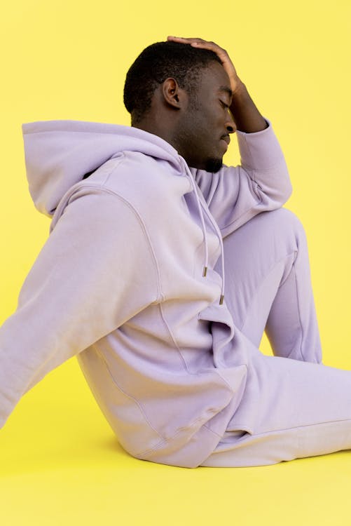 A Man Wearing a Purple Hoodie 