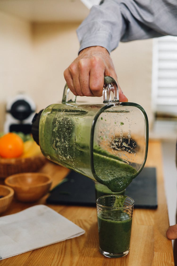 Pouring Juice To Glass