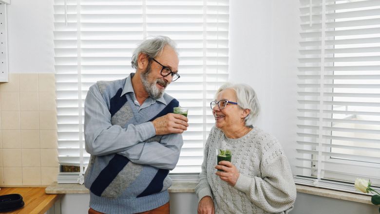 Senior couple smiling in a kitchen