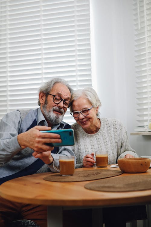 Happy Old Couple Taking Selfie on Mobile Phone