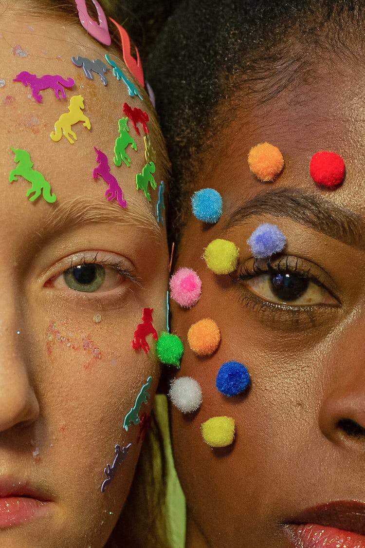 Crop Diverse Serious Women With Multicolored Stickers On Faces