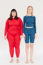 Content women in sportswear with different bodies