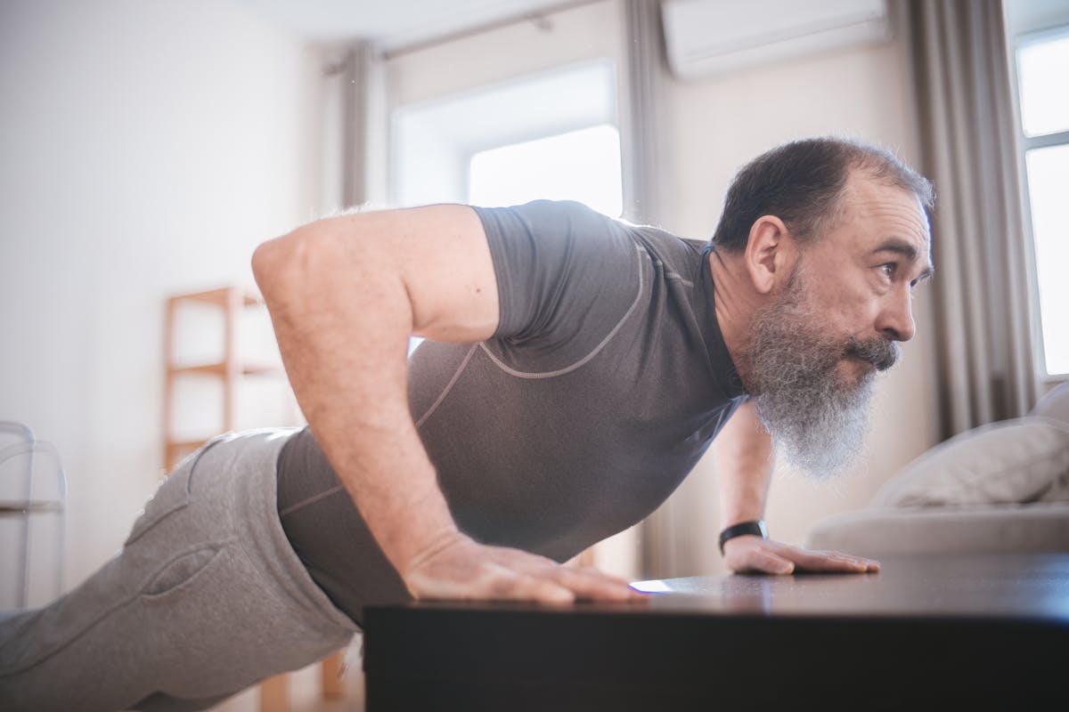 Man doing push-ups at home workout