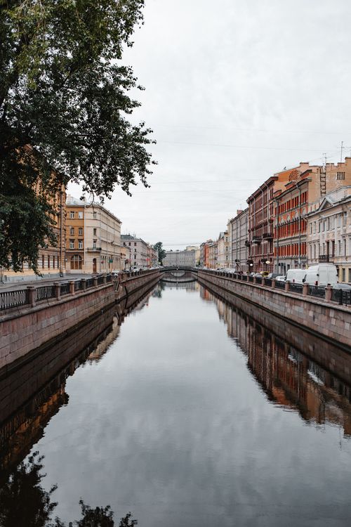 Free Explore the charming Griboyedov Canal with historic buildings in St Petersburg, Russia. Stock Photo