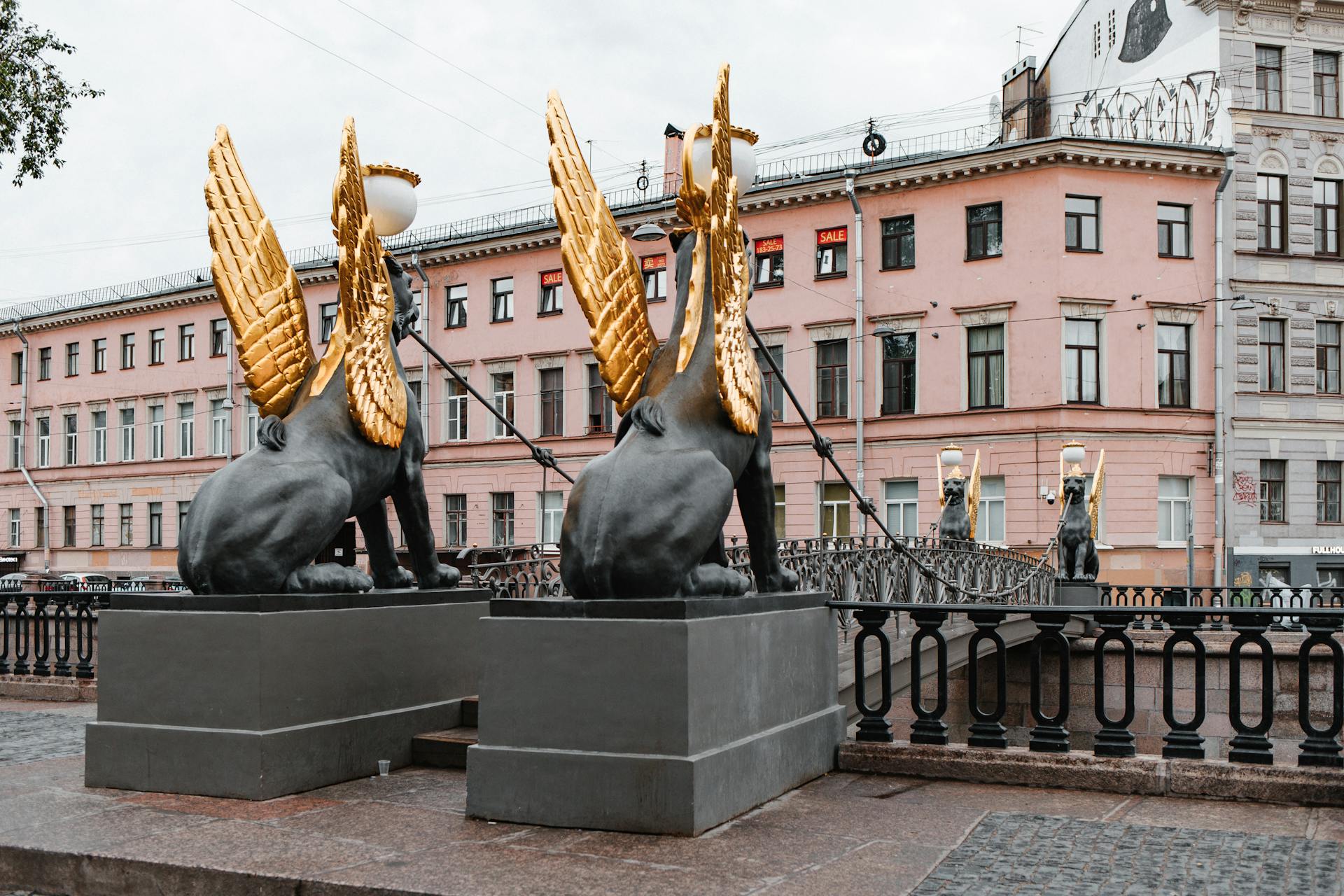 The Golden Winged Mysterious Myth Griffons at the Bank Bridge in St. Petersburg, Russia