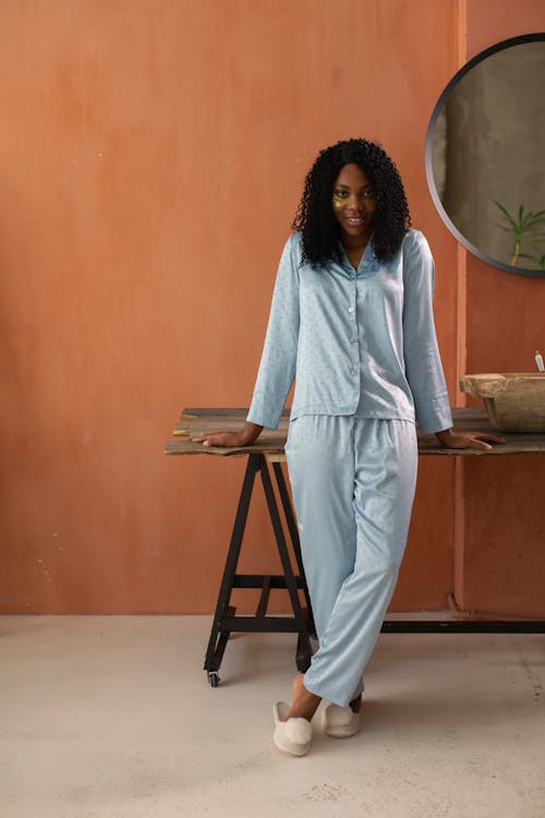 Free Photograph of a Woman Wearing Blue Pajamas Stock Photo