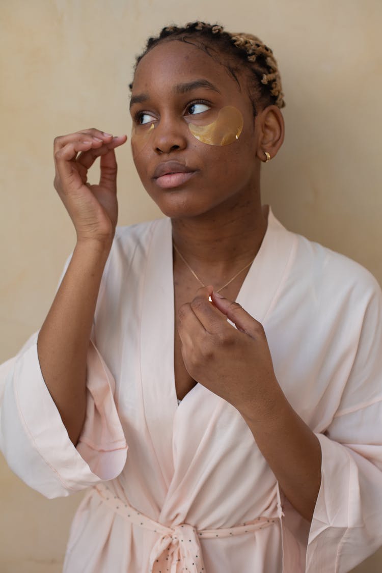 Woman In Bathrobe Doing Beauty Procedures