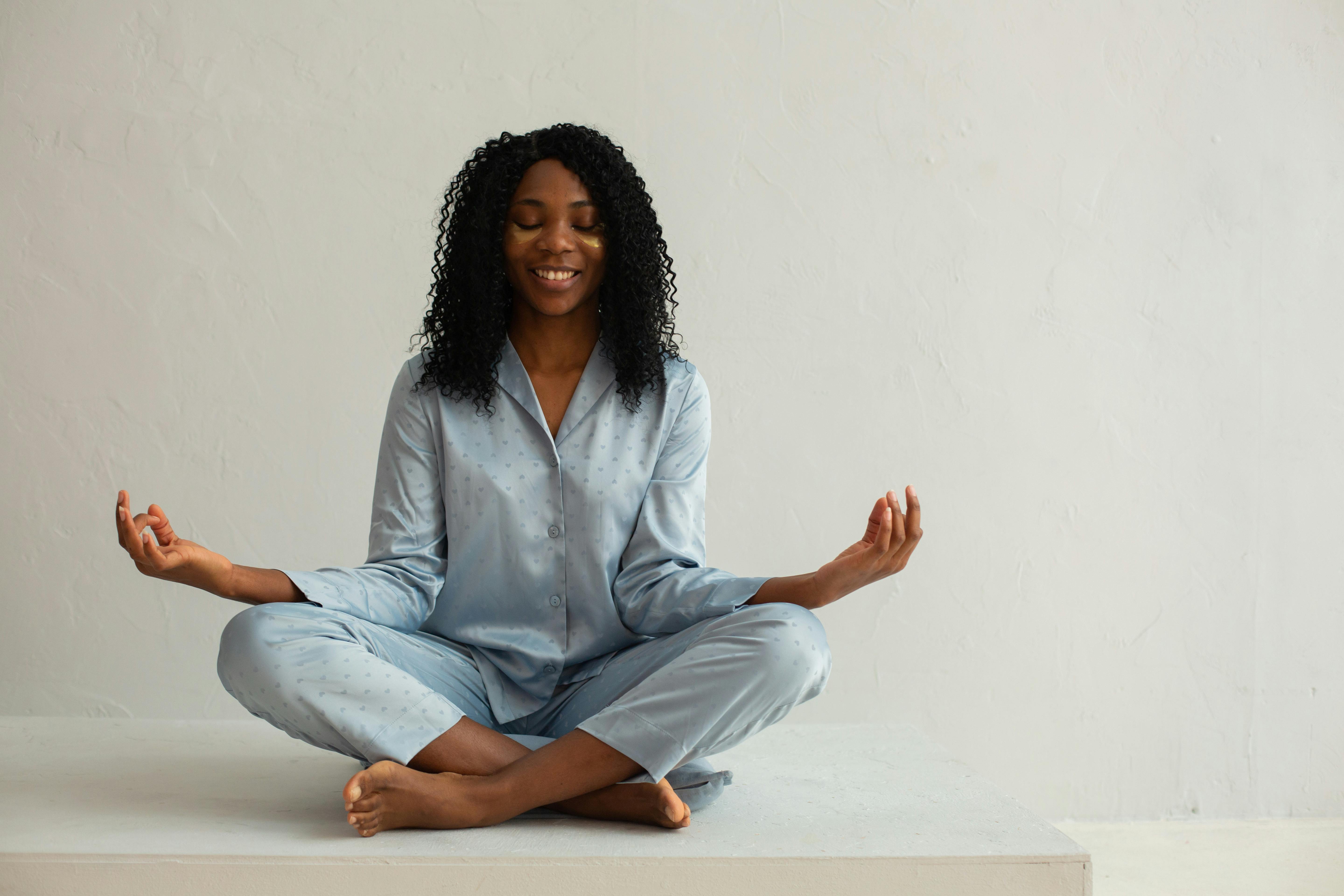 Woman with Curly Hair Doing Yoga · Free Stock Photo