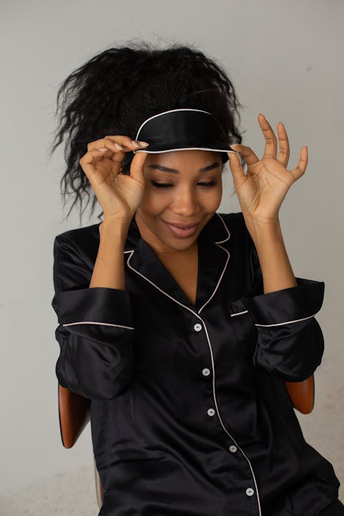 Free Close-Up Shot of a Woman Wearing a Black Sleepwear Stock Photo