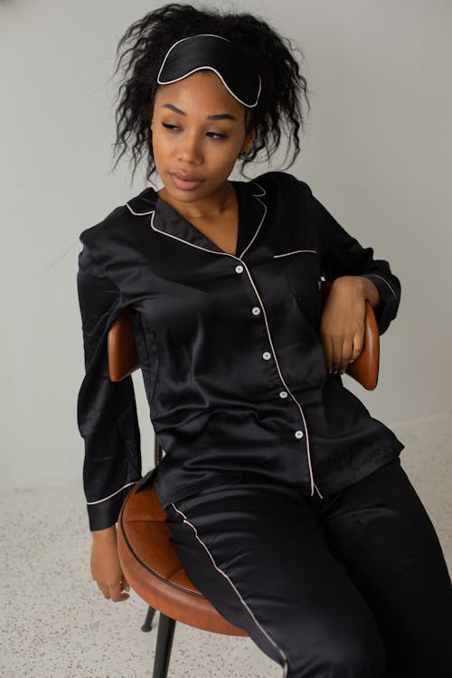 Free Close-Up Shot of a Woman Wearing a Black Sleepwear Stock Photo