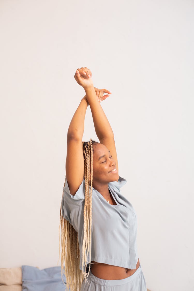 Woman In Pyjama Stretching