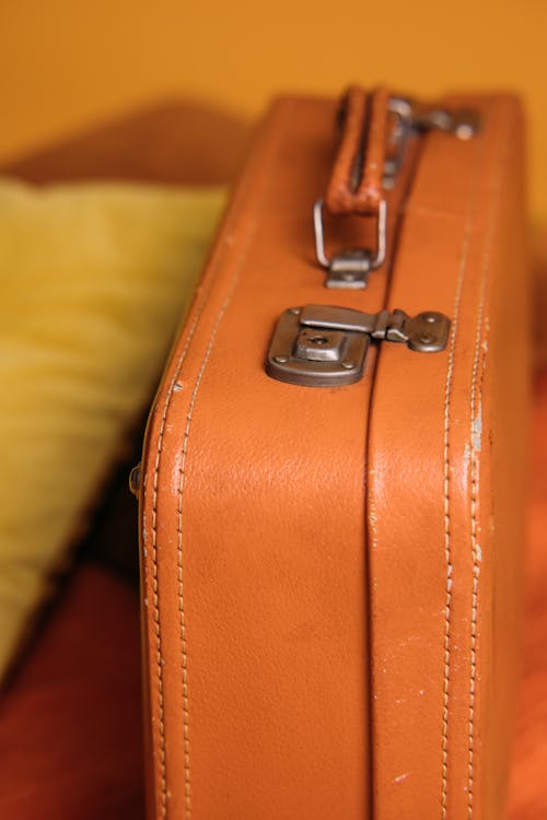 Close-Up Shot of Orange Suitcase