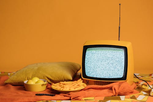 can you learn English by watching tv