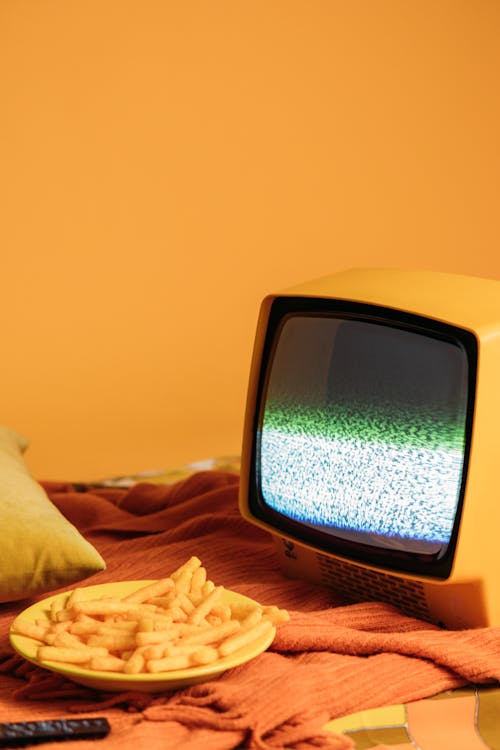 Yellow Vintage Television With Blank Screen · Free Stock Photo