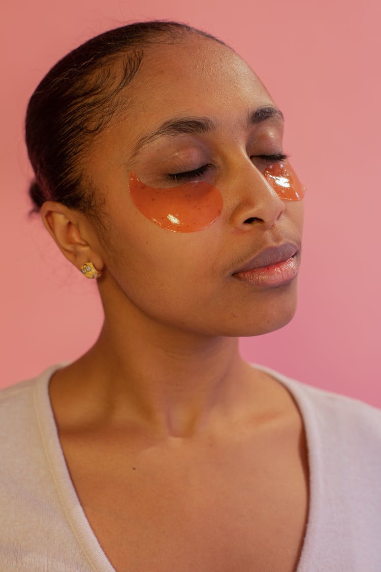 Serene Black Woman In Gel Eye Patches In Studio