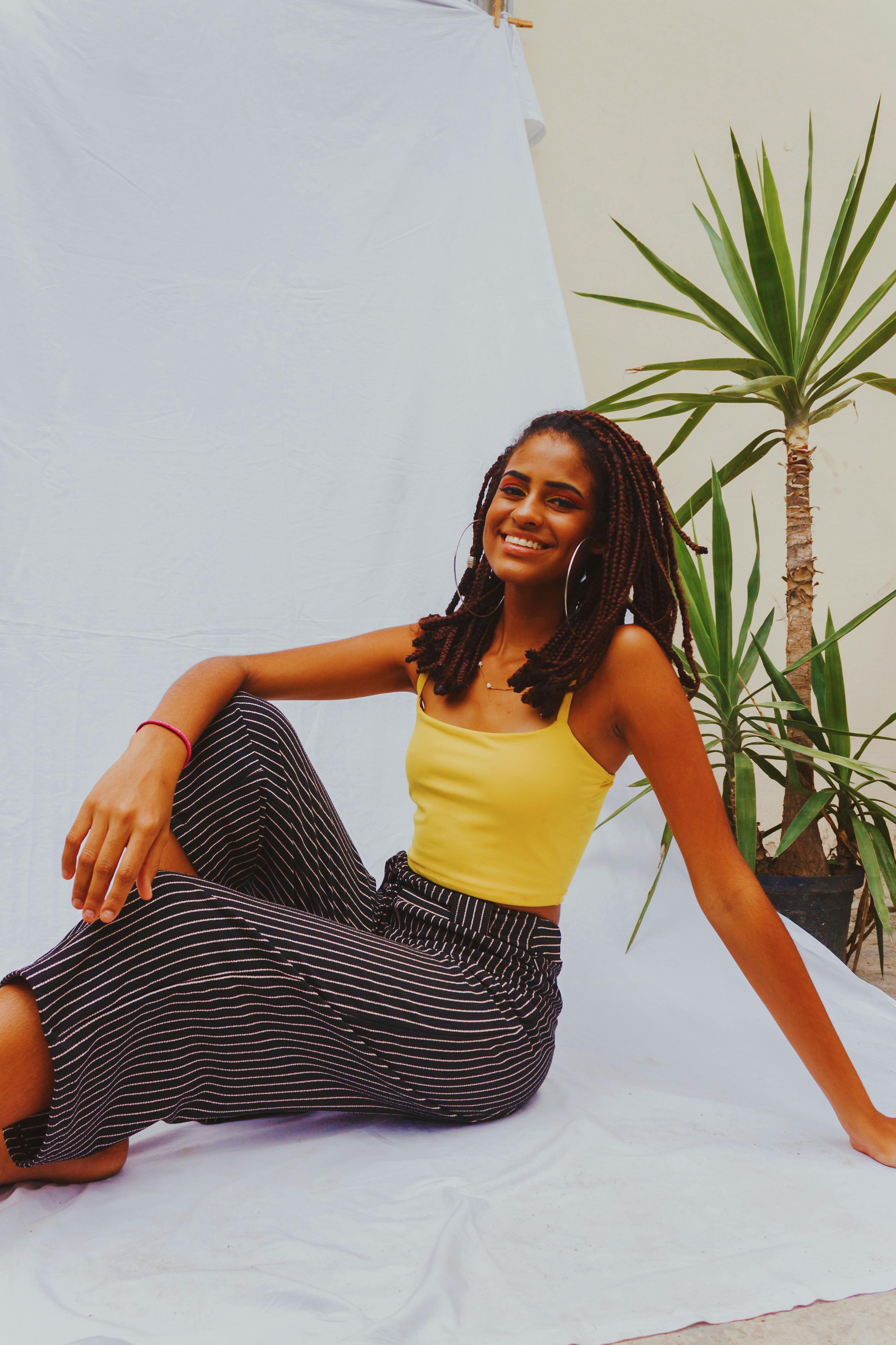 Woman Wearing Yellow Tank Top · Free Stock Photo