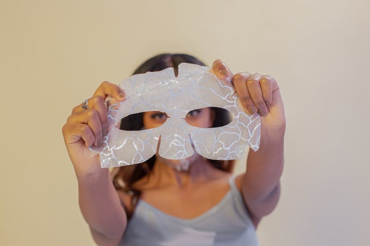 Ethnic Woman Demonstrating Soothing Eye Mask