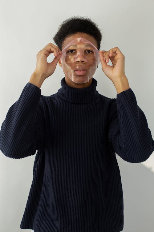 Young black man with facial mask