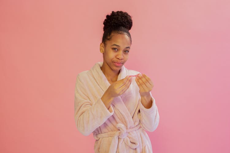 Content Black Woman With Lip Mask