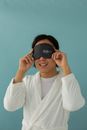 Woman in White Long Sleeve Shirt Holding Black Canon Camera
