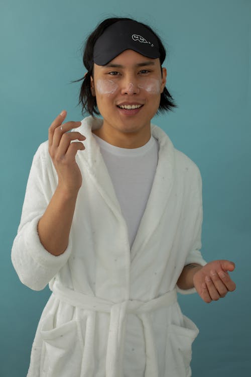 Free Man with Under Eye Patch Wearing White Bathrobe Stock Photo