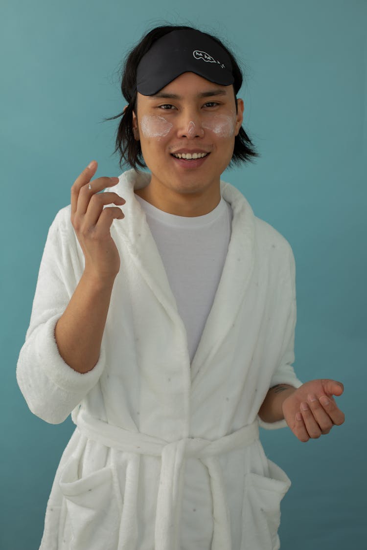 Man With Under Eye Patch Wearing White Bathrobe