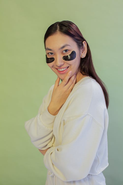 Woman with Under Eye Patches Smiling