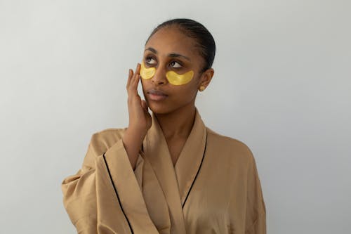 Woman in Brown Sleepwear with Eye Mask