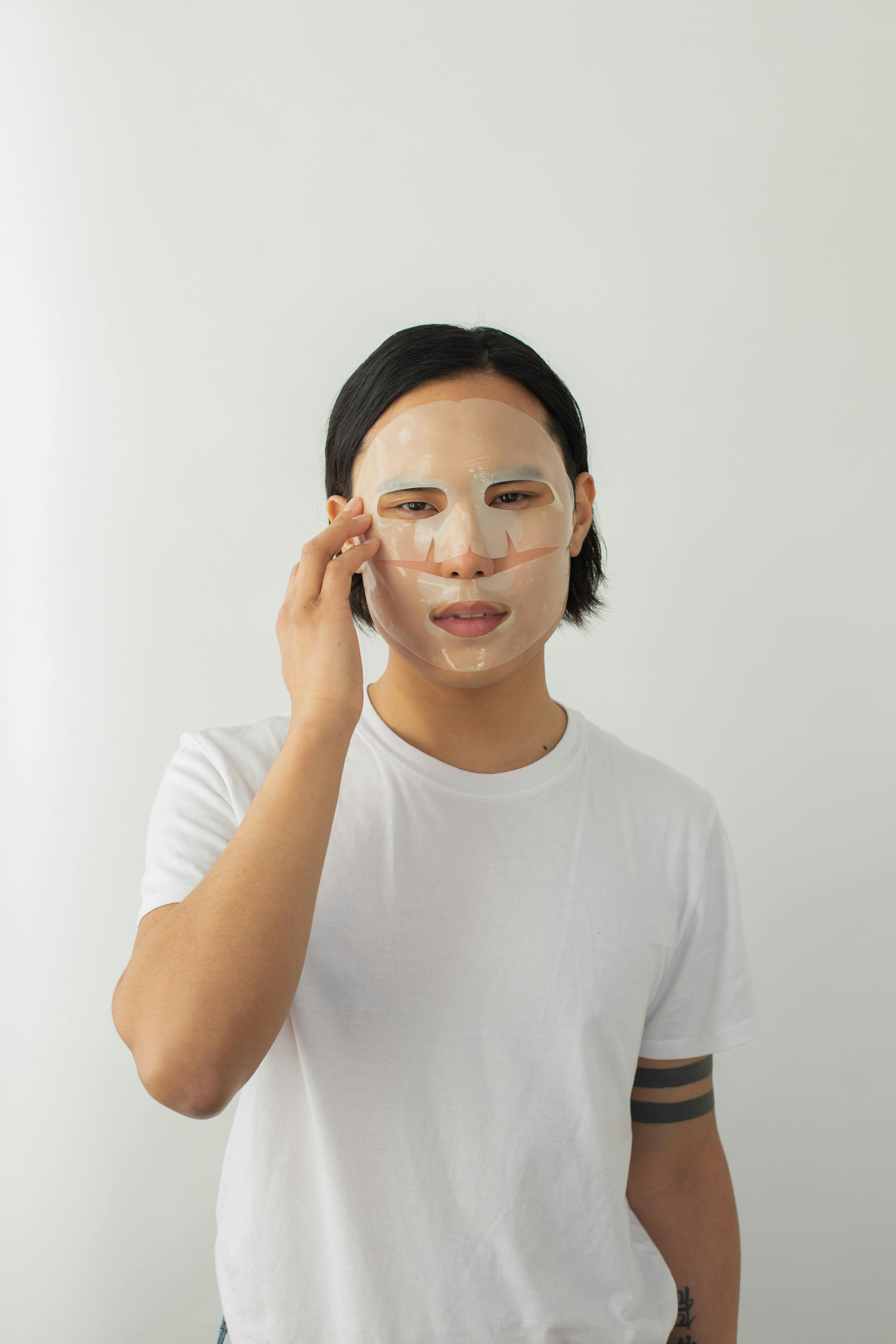 asian man with facial mask