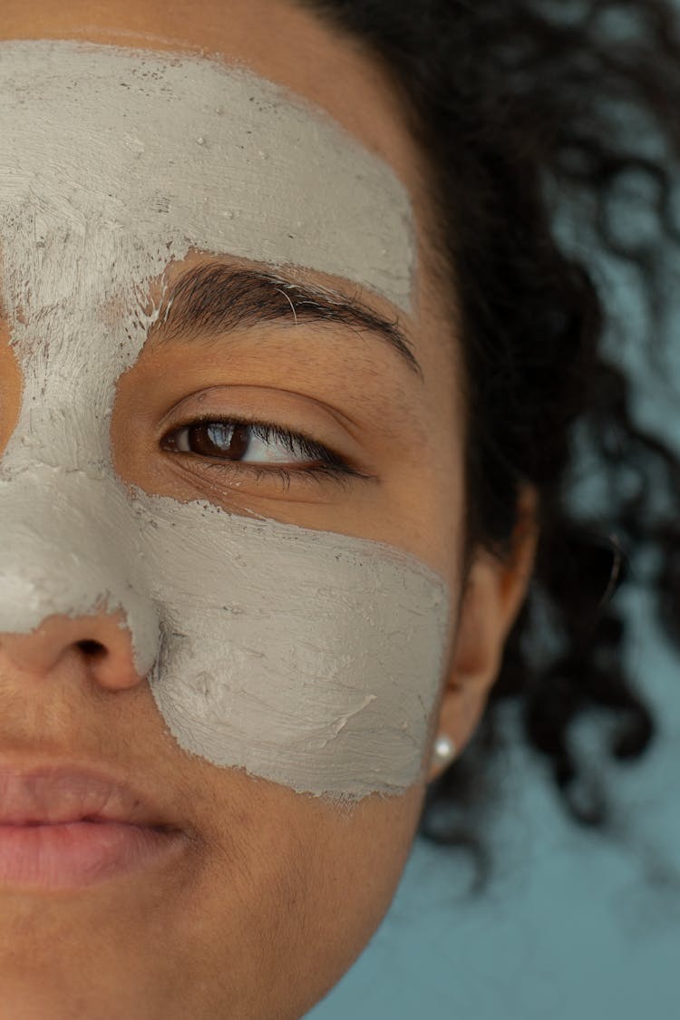 Content Black Woman In Clay Mask