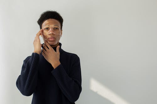 Serious black man with facial mask