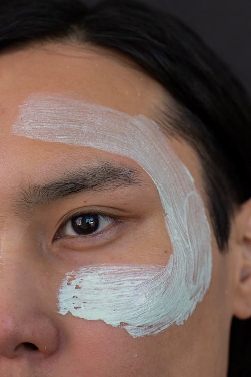 Anonymous Asian man with facial mask