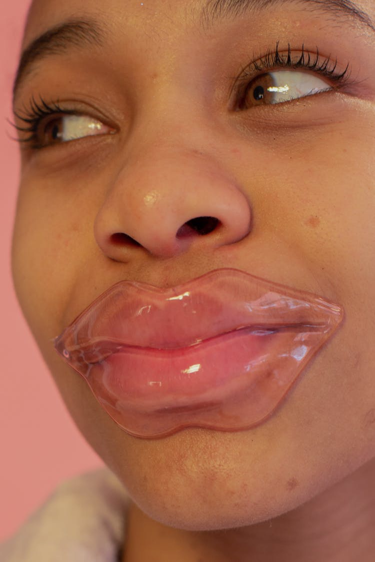 Black Woman With Lip Mask