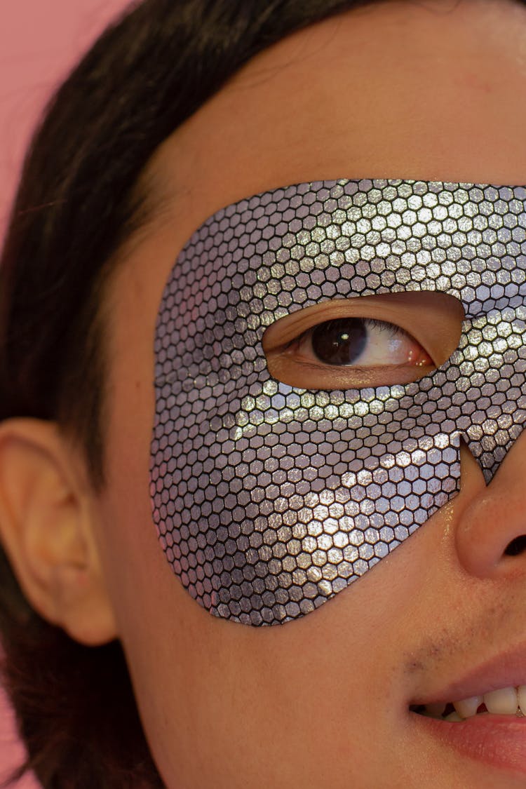 Unrecognizable Positive Asian Man In Eye Mask
