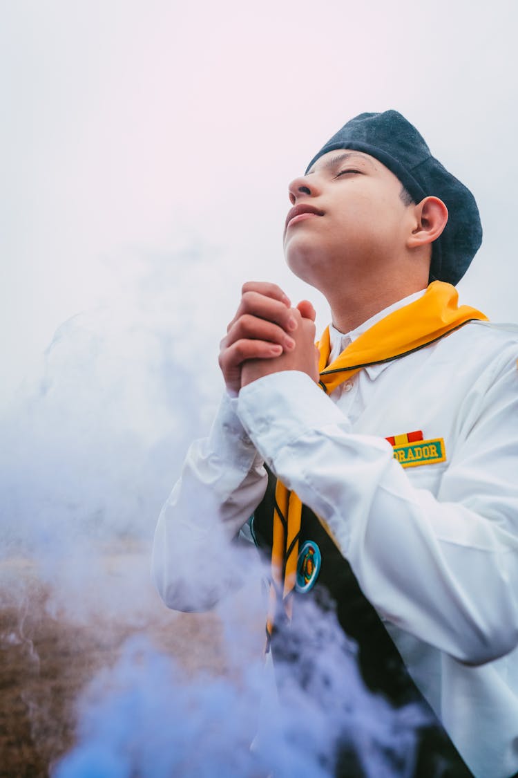 Boy In Scout Uniform Praying