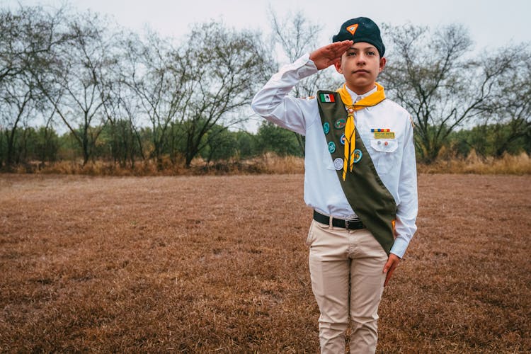 Portrait Of A Boy Scout Saluting