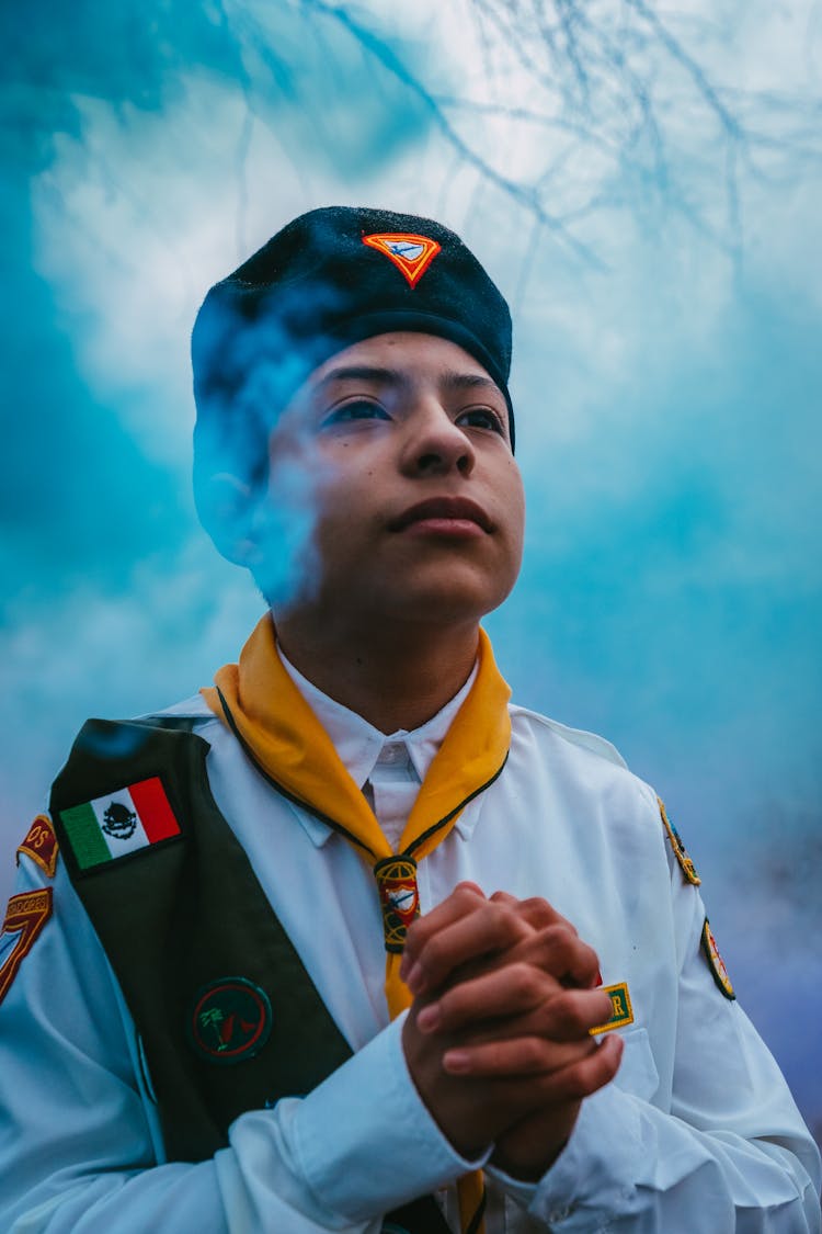 Portrait Of A Boy Scout With His Hands Together