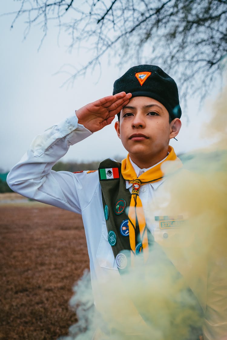 A Boy Scout Saluting