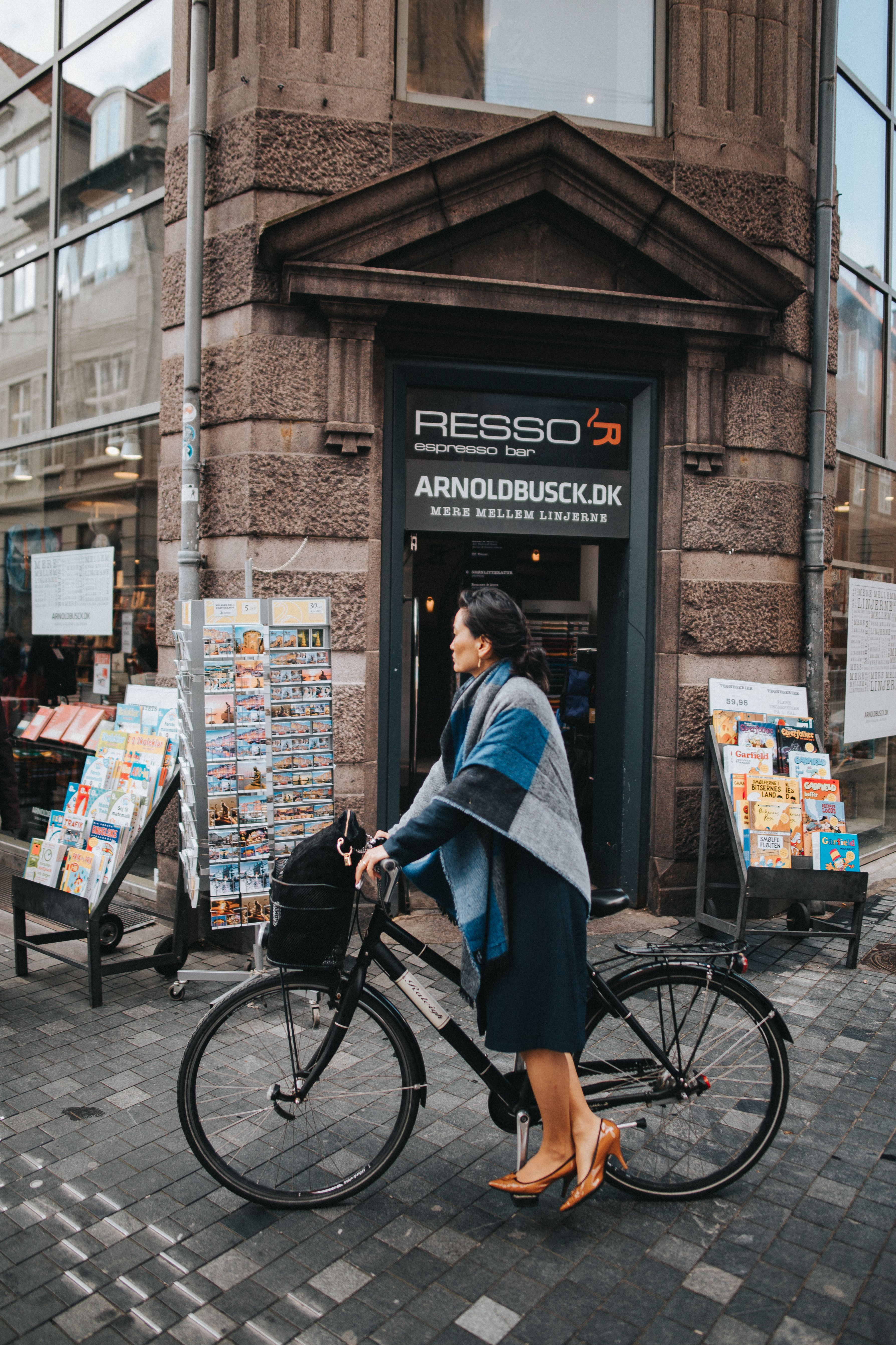 Woman in Black Dress Standing beside Black Bicycle · Free Stock Photo