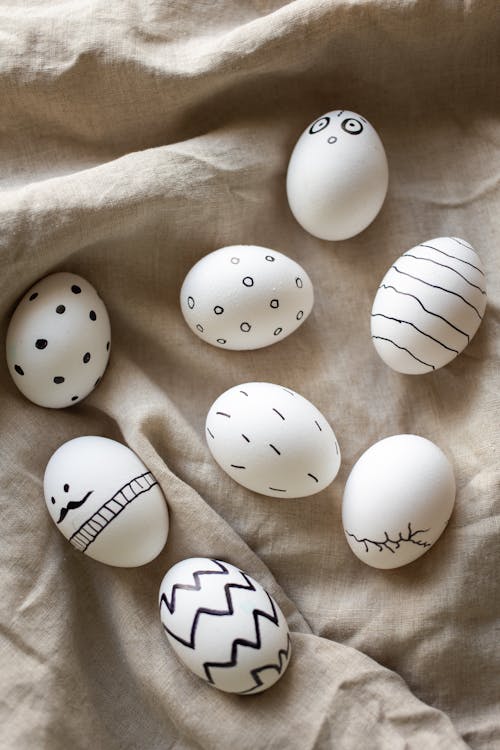 Close-Up Shot of Designed Eggs on a Cloth