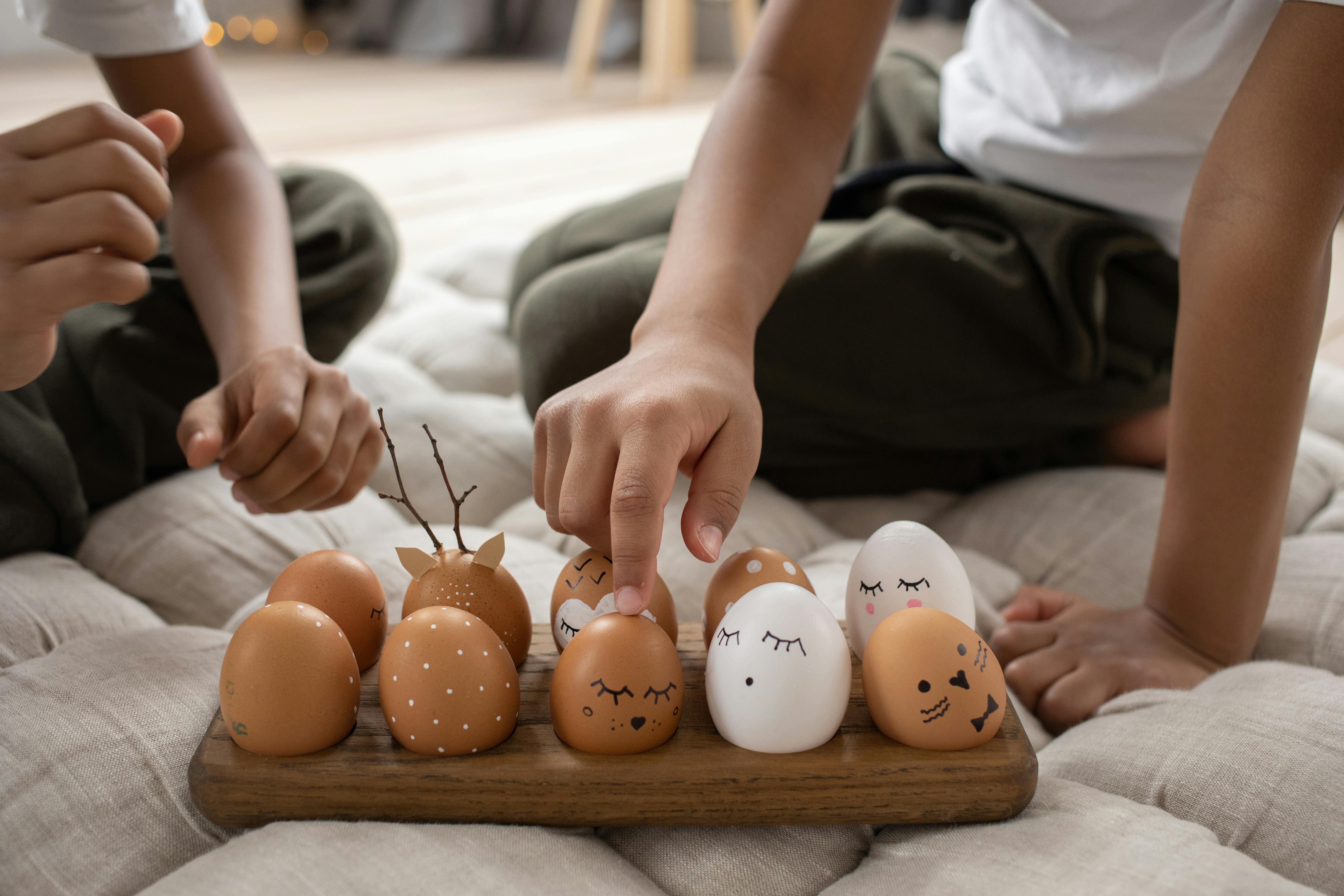 painted eggs on wooden board